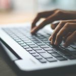 Businesswoman using laptop