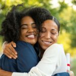 Mother and her daughter hugging at her graduation